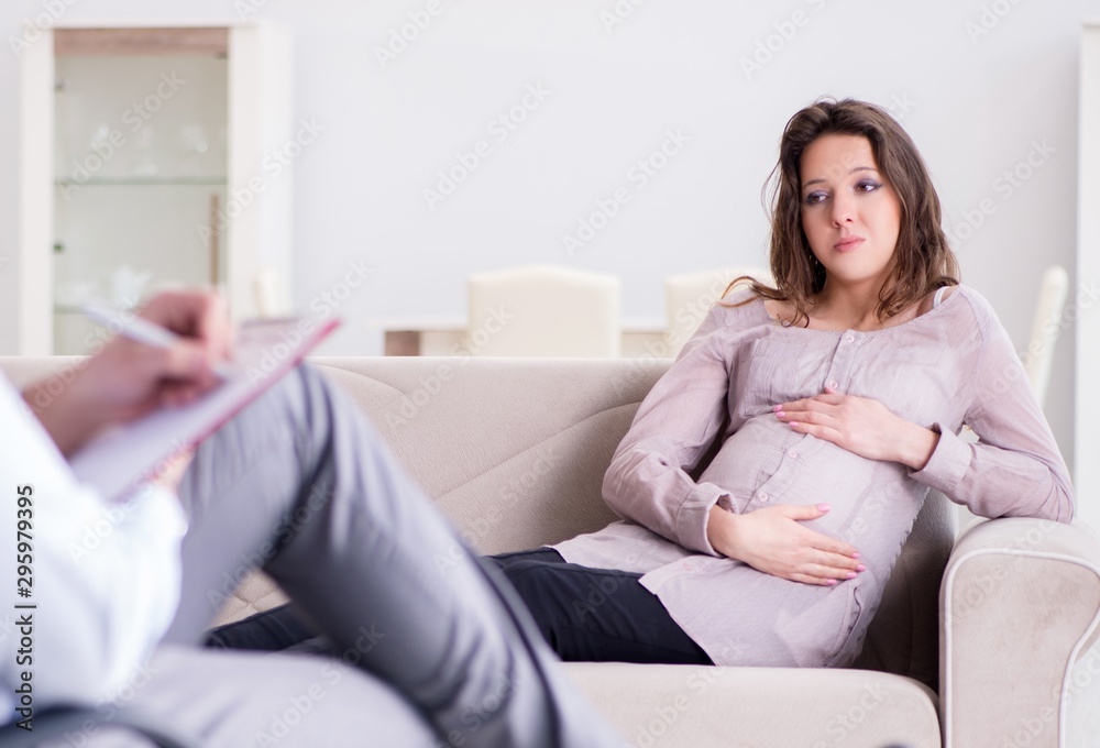 The pregnant woman visiting psychologist doctor The pregnant woman visiting psychologist doctor