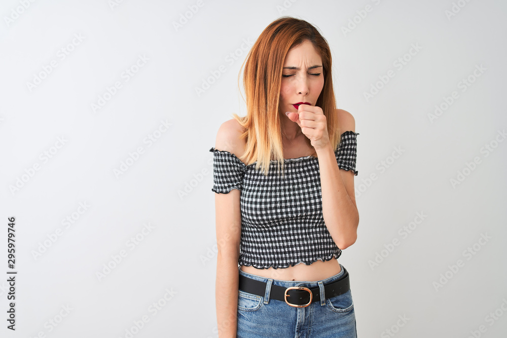 Beautiful redhead woman wearing casual t-shirt standing over isolated white background feeling unwell and coughing as symptom for cold or bronchitis. Healthcare concept. Beautiful redhead woman wearing casual t-shirt standing over isolated white background feeling unwell and coughing as symptom for cold or bronchitis. Healthcare concept.