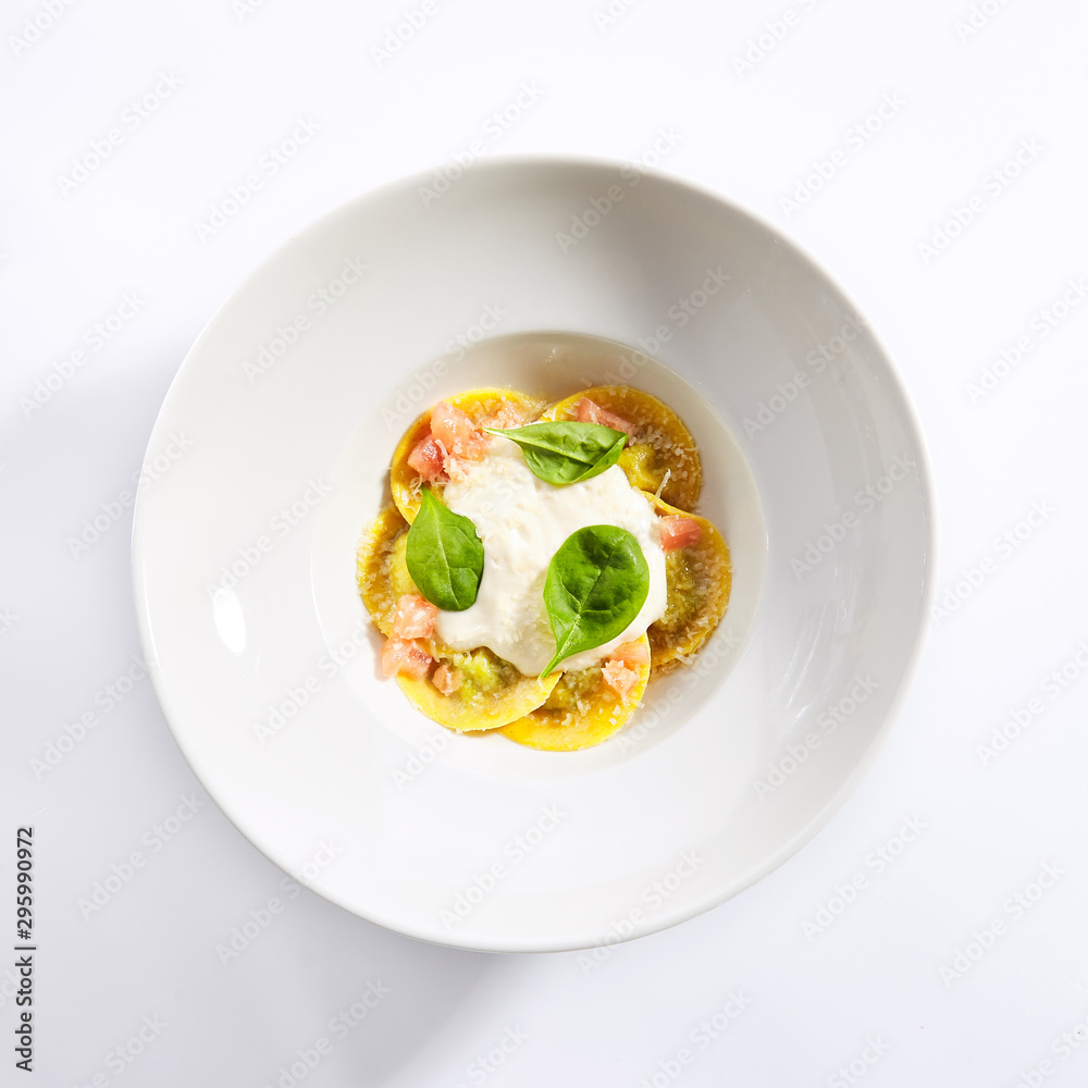 Ravioli with spinach, concasse and cheese espuma Ravioli with spinach, concasse and cheese espuma