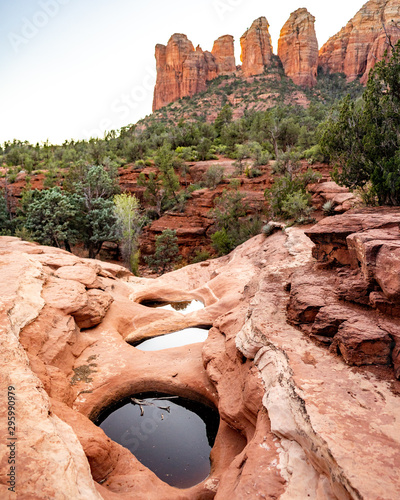 Sedona iconic 7 Sacred Pools in front of Coffee Pot Red Rock sandstone formation at sunset
