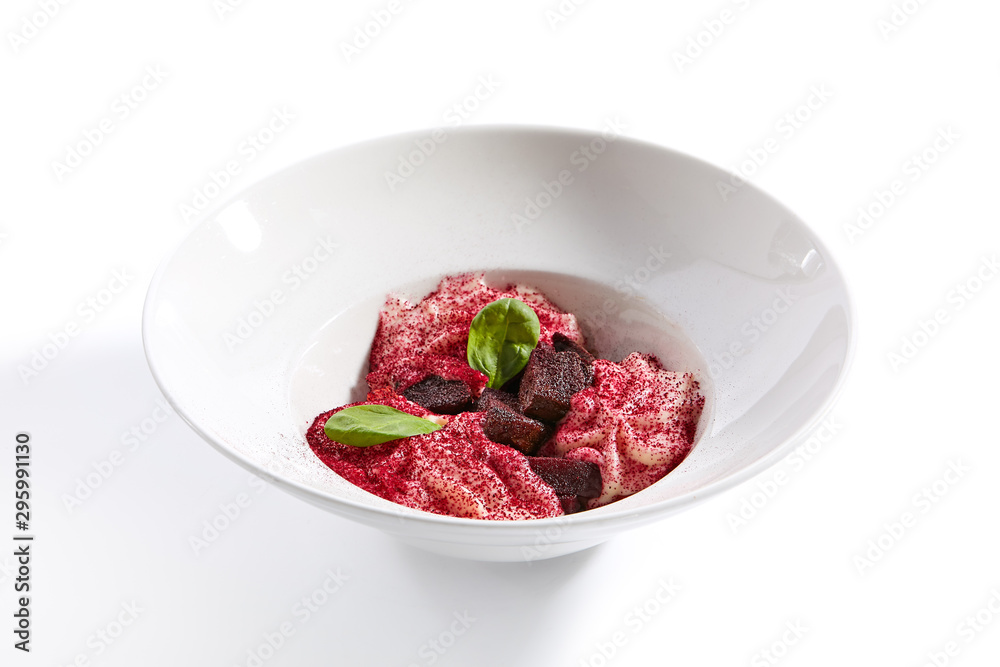 Baked beet and goat cheese espuma appetizer closeup Baked beet and goat cheese espuma appetizer closeup
