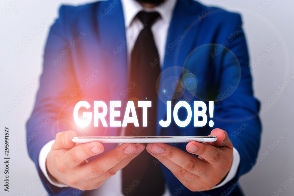 Handwriting text writing Great Job. Conceptual photo used praising someone for something they have done well Businessman in blue suite with a tie holds lap top in hands Handwriting text writing Great Job. Conceptual photo used praising someone for something they have done well Businessman in blue suite with a tie holds lap top in hands