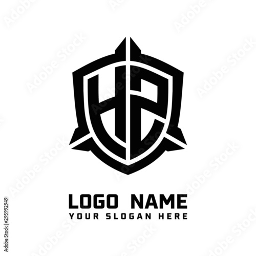 initial HZ letter with shield style logo template vector. shield shape black monogram logo