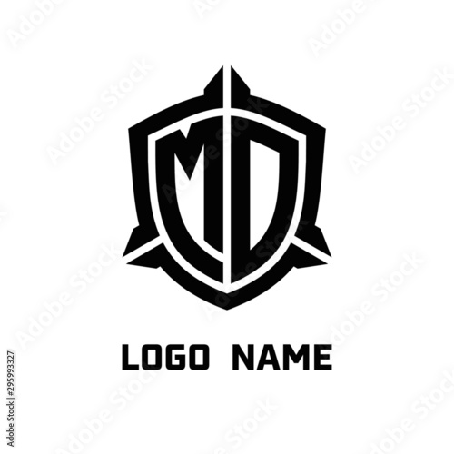 initial MO letter with shield style logo template vector. shield shape black monogram logo
