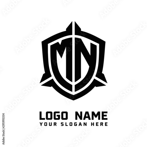 initial MN letter with shield style logo template vector. shield shape black monogram logo