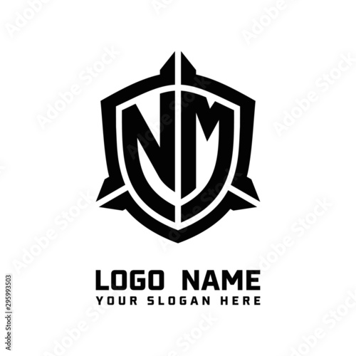 initial NM letter with shield style logo template vector. shield shape black monogram logo