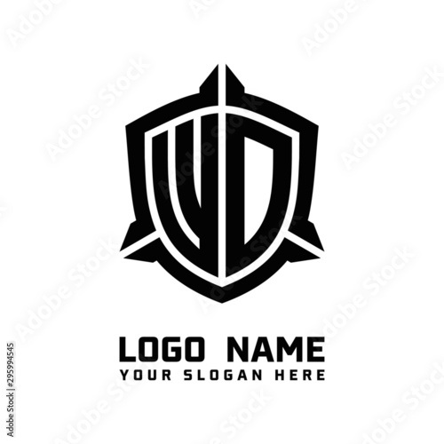 initial WD letter with shield style logo template vector. shield shape black monogram logo