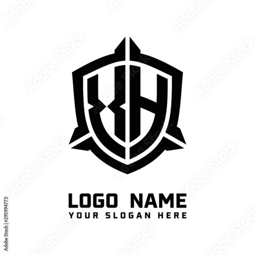 initial XH letter with shield style logo template vector. shield shape black monogram logo