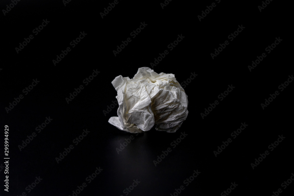 used of white tissue paper isolated on black background used of white tissue paper isolated on black background