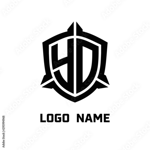 initial YO letter with shield style logo template vector. shield shape black monogram logo