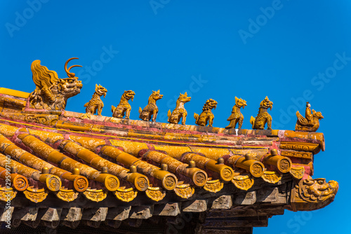 Close-up of the golden tiles rooftops of The Forbidden City,the former Chinese imperial palace from the Ming dynasty to the end of the Qing dynasty, the biggest palace in the world.