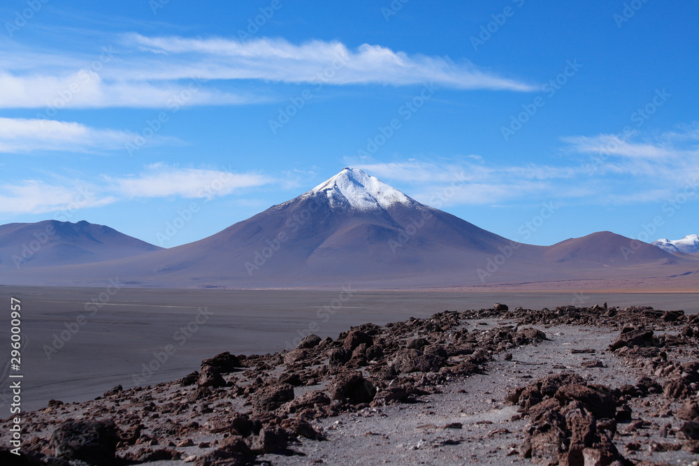Laguna Colorada. Landscape of Siloli Desert. Snow-capped volcanoes and desert landscapes in the highlands of Bolivia. Andean landscapes of the Bolivia Plateau