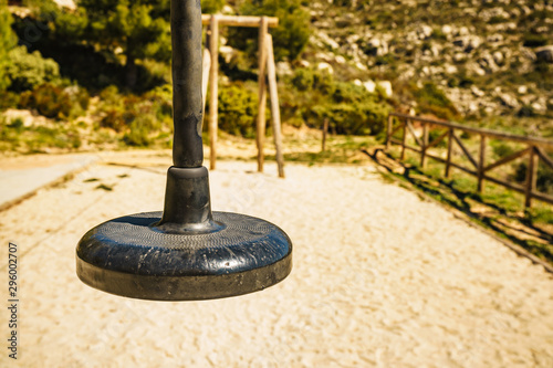 Zip wire with empty seat at playground © Voyagerix