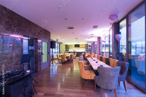 Interior of a hotel bar restaurant with party decoration