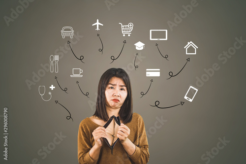 poor Asian woman hand holding empty wallet spent all money for debt 