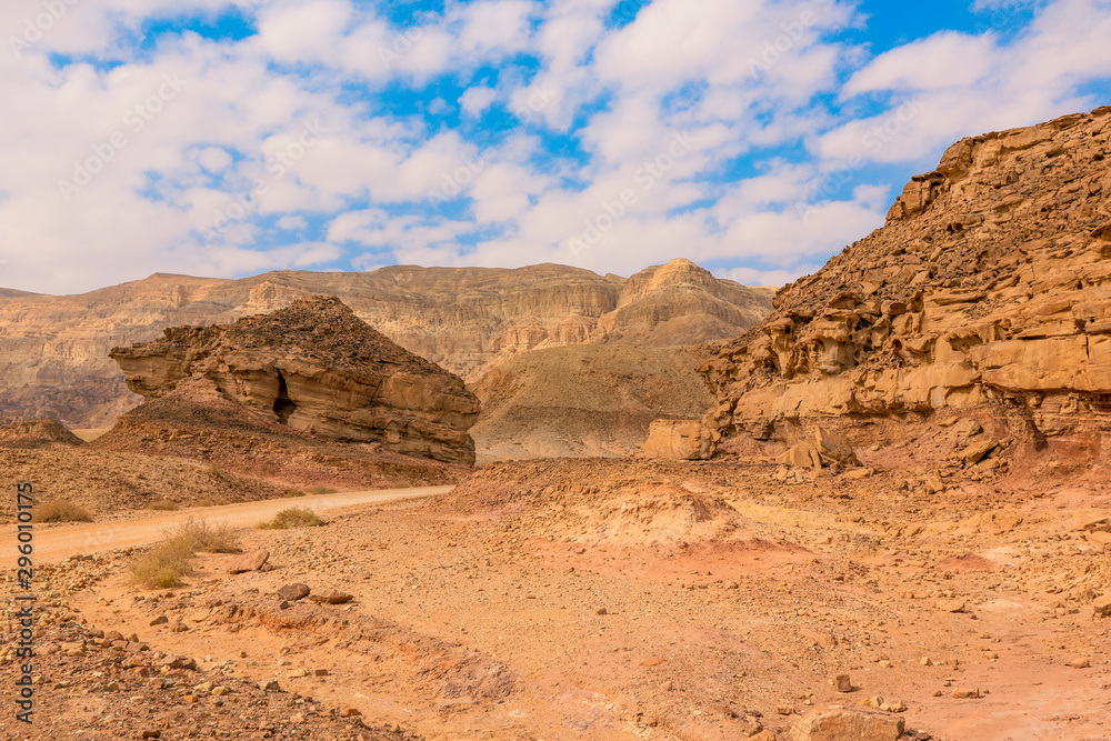 Amazing View to the Red Rocks and Desert Sands in Timna National Park, Israel Amazing View to the Red Rocks and Desert Sands in Timna National Park, Israel