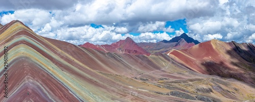 Landscape shot of the beautiful and colorful Rainbow Mountains in Peru photo