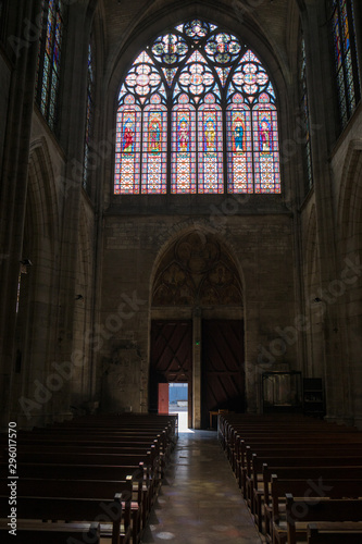 Main nave and colorful stained glass windows  in  Basilique Saint-Urbain, 13th century gothic church in Troyes, France