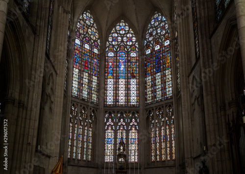 Colorful stained glass windows and altar in Basilique Saint-Urbain, 13th century gothic church in Troyes, France