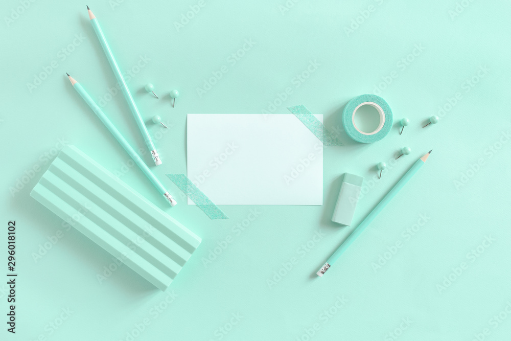 White paper mockup and set of mint stationery White paper mockup and set of mint stationery