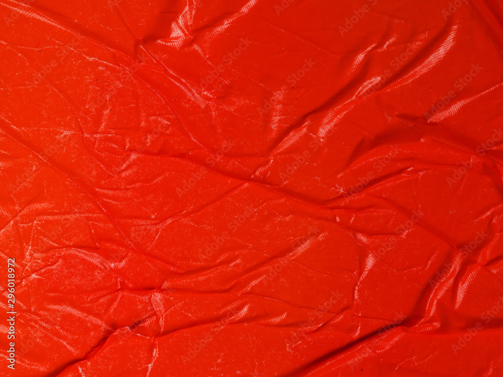 Fototapeta premium Close-up crumpled red paper background