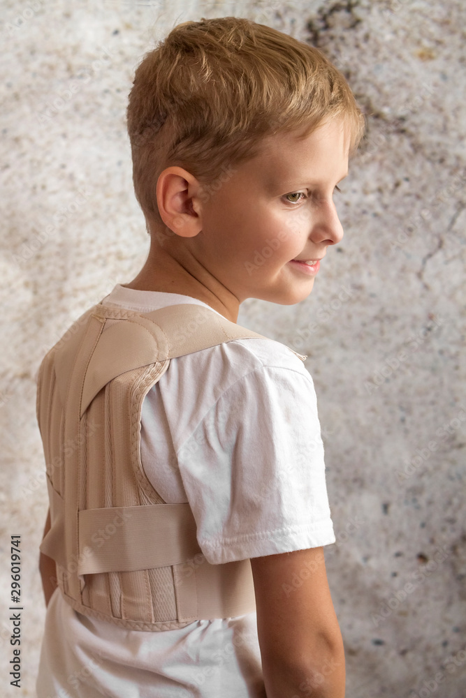 the boy is a blond in a corset the boy is a blond in a corset