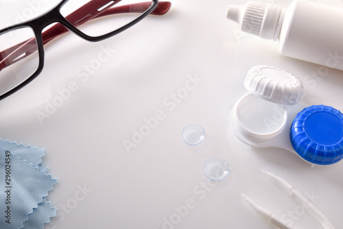 Various elements for vision correction on white table elevated view