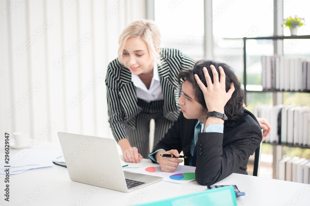 Fototapeta premium Business man and business woman are analytics business data, business plan concept