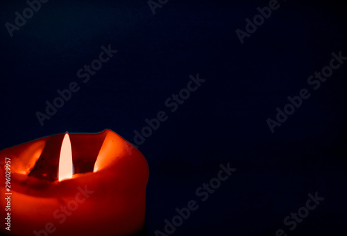 Canvas Print Red holiday candle on dark background, luxury branding design and decoration for