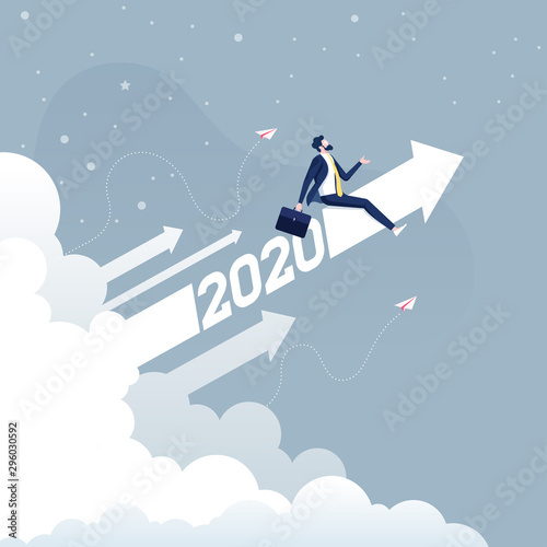 Businessman riding 2020 arrow going up-Business concept