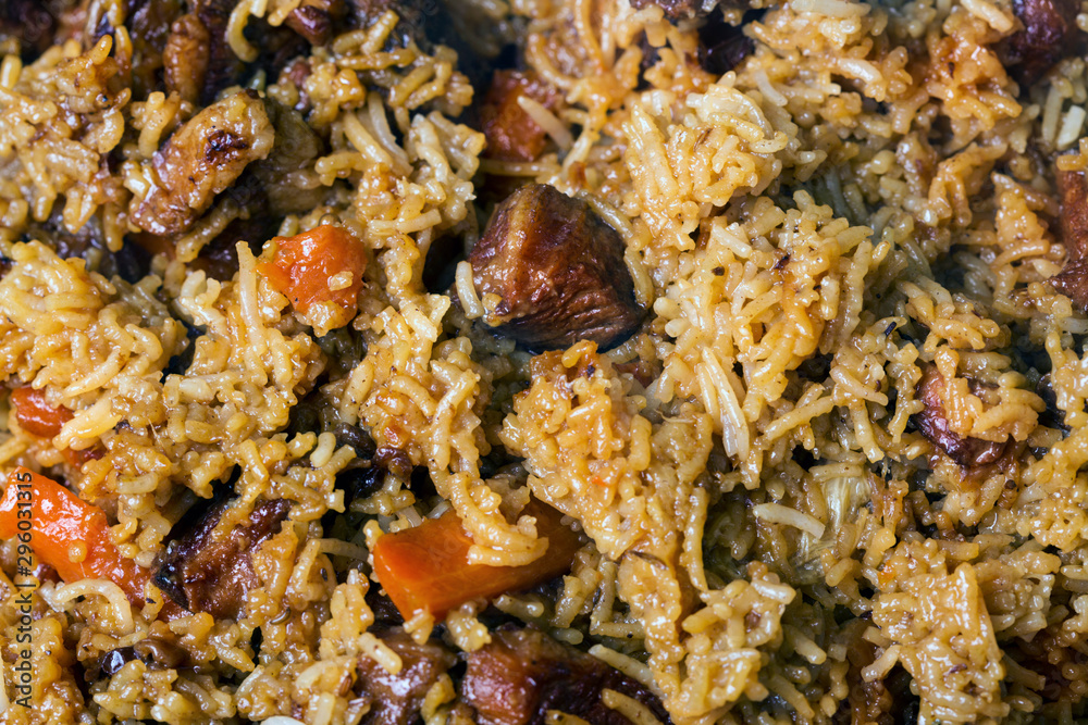 Cooking of traditional Uzbek pilaf Cooking of traditional Uzbek pilaf