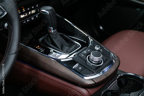 Close-up of the accelerator handle and buttons with  modern central console with  controls. automatic transmission gear of car , car interior. © Виталий Сова