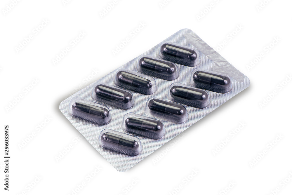 Closeup package of activated charcoal or activated carbon isolated on white background.Benefits for treat alcohol poisoning,prevent hangover,emergency toxin removal. Clipping path. Closeup package of activated charcoal or activated carbon isolated on white background.Benefits for treat alcohol poisoning,prevent hangover,emergency toxin removal. Clipping path.