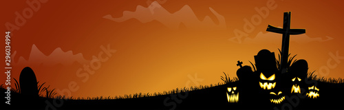 halloween cemetery with spooky faces