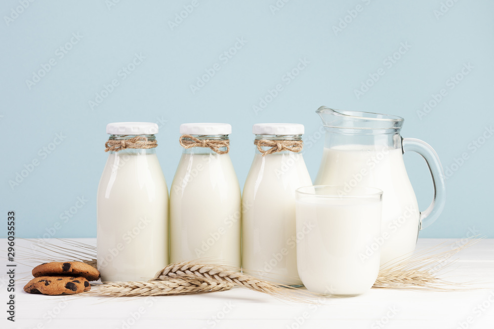 Bottles of fresh milk with american cookies Bottles of fresh milk with american cookies