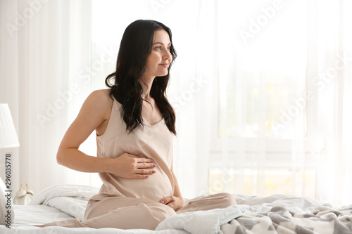 Beautiful young pregnant wo...