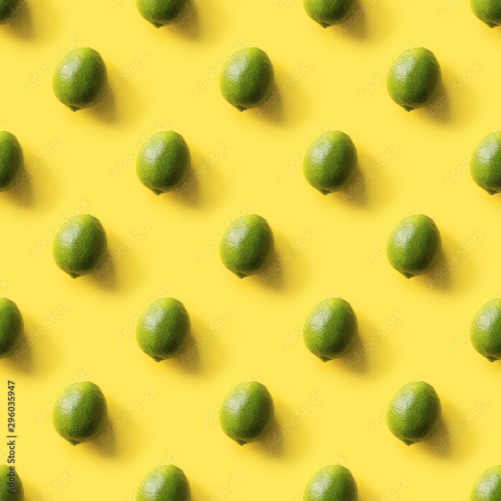 Seamless limes pattern on yellow background. Creative tropical food concept. Flat lay. Top view. Seamless limes pattern on yellow background. Creative tropical food concept. Flat lay. Top view.