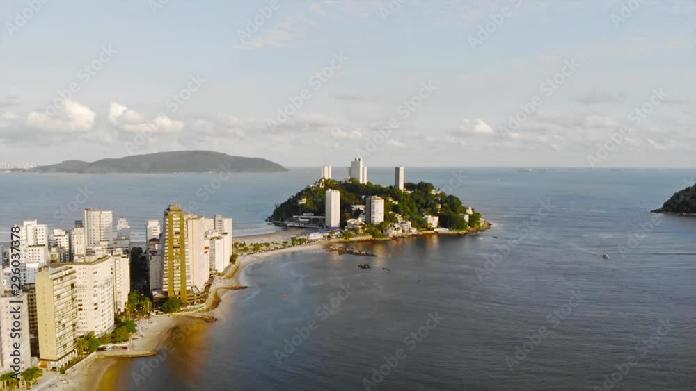 Top Are View Of A Small Island With A White Skyscraper Near A Beautiful Beach - Forwards Top Are View Of A Small Island With A White Skyscraper Near A Beautiful Beach - Forwards