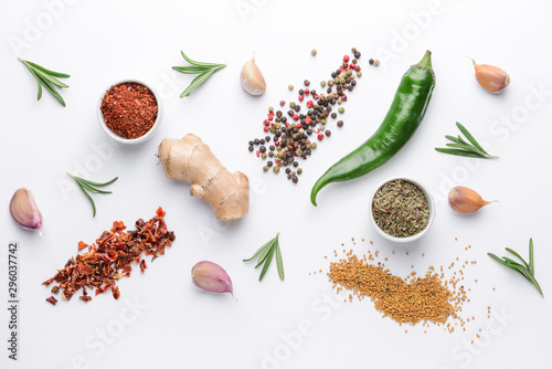 Fototapeta Naklejka Na Ścianę i Meble -  Different spices on white background