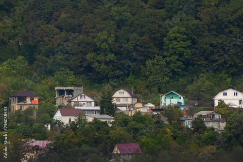 Wallpaper Mural Village in the forest at the foot of the mountain Torontodigital.ca