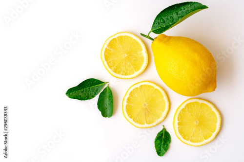 Lemon lime fruit with green leaf and sliced isolated on white background . Top view.Flat lay. Space for text.