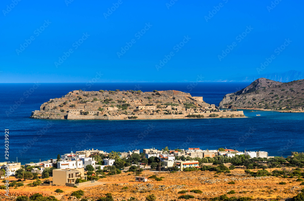 The famous island of Spinalonga, the leper colony and fortress at Plaka, Elounda bay of Crete island in Greece.