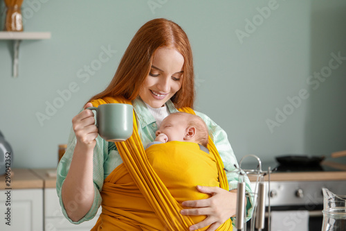 Young mother with little ba...