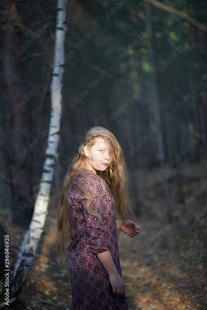 Beautiful girl with white hair in the autumn forest Beautiful girl with white hair in the autumn forest