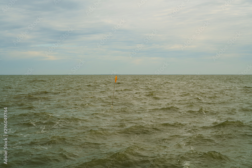 Lonely buoy in the sea
