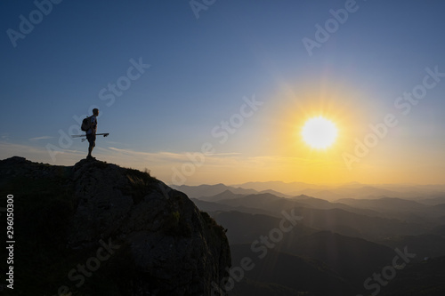 man doing sports in the natural park of Aiako Harriak at sunset, Euskadi © poliki