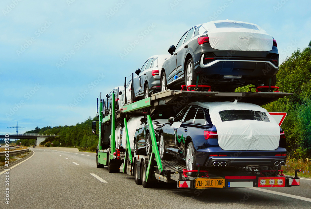  The trailer is engaged in the delivery of new cars