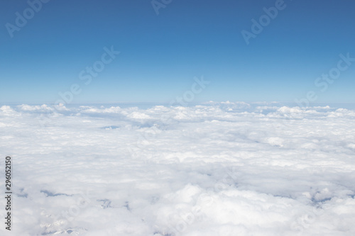 White cloud and blue sky, a view from airplane window