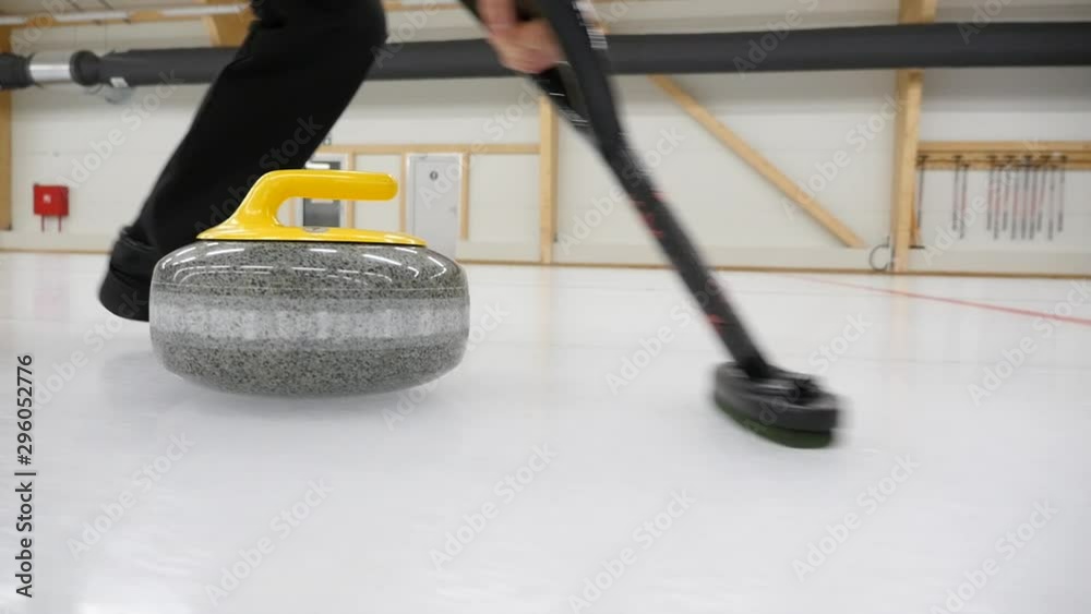 custom made wallpaper toronto digitalCurling game. Curler is sweeping the ice surface in the path of the stone. Curling granit stone is sliding and broom or brush is sweeping. Concept: winter games, winter olympic sports.