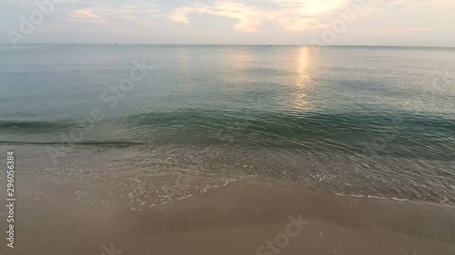 Tropical beach with morning sunrise
